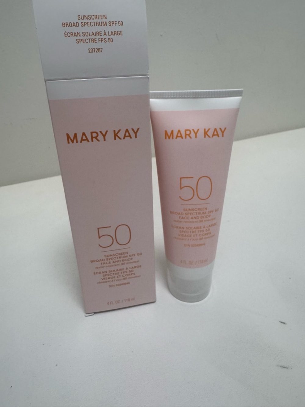 Mary Kay Face Sunscreen Tube in Pale Pink with Gold Accents